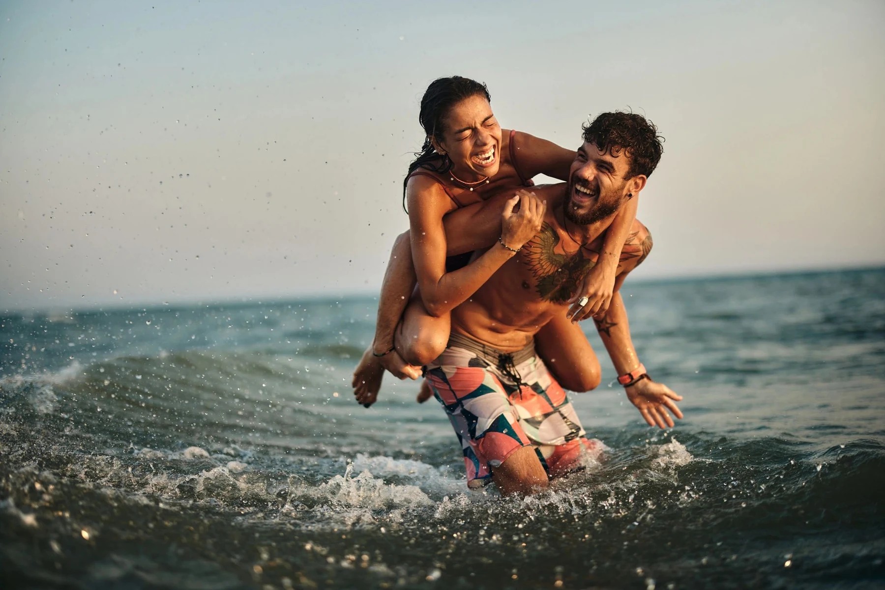 Couple enjoying a day by the ocean