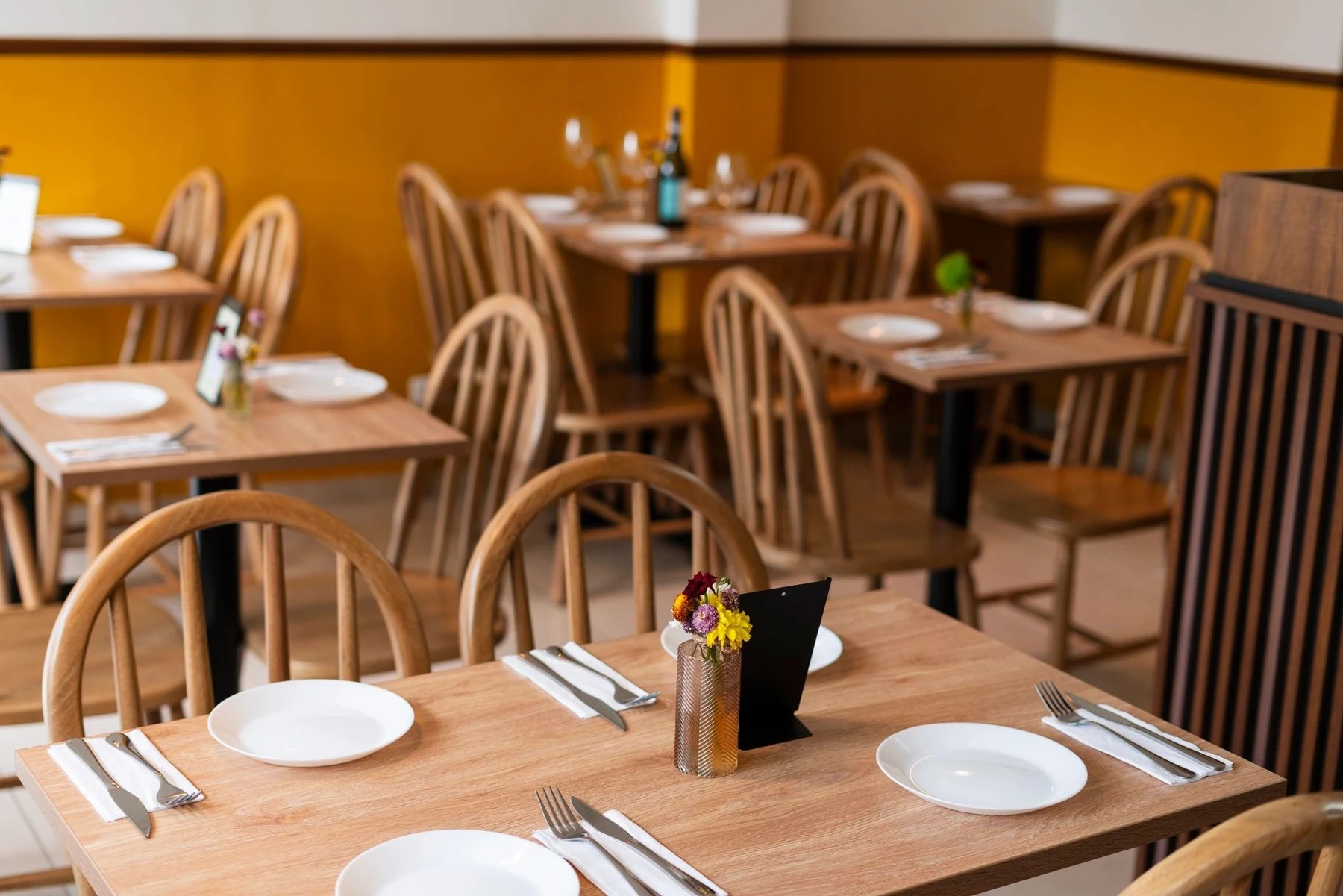 Welcoming restaurant with carefully set tables